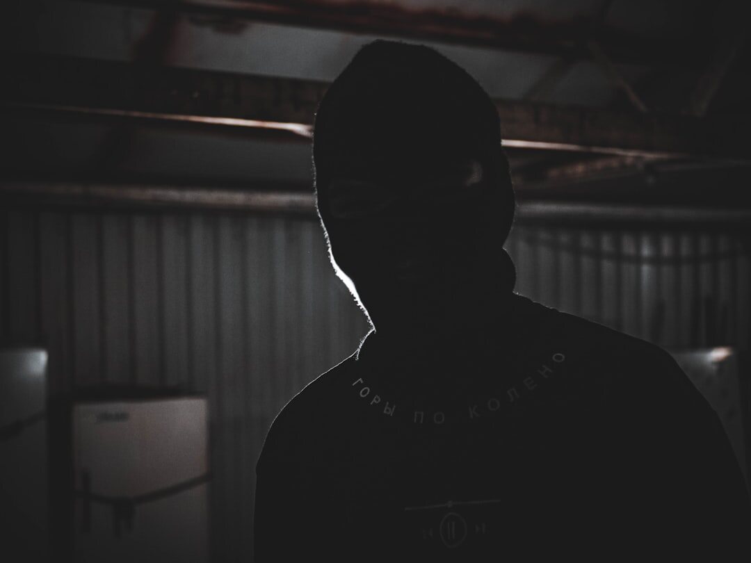 mysterious man in shadows