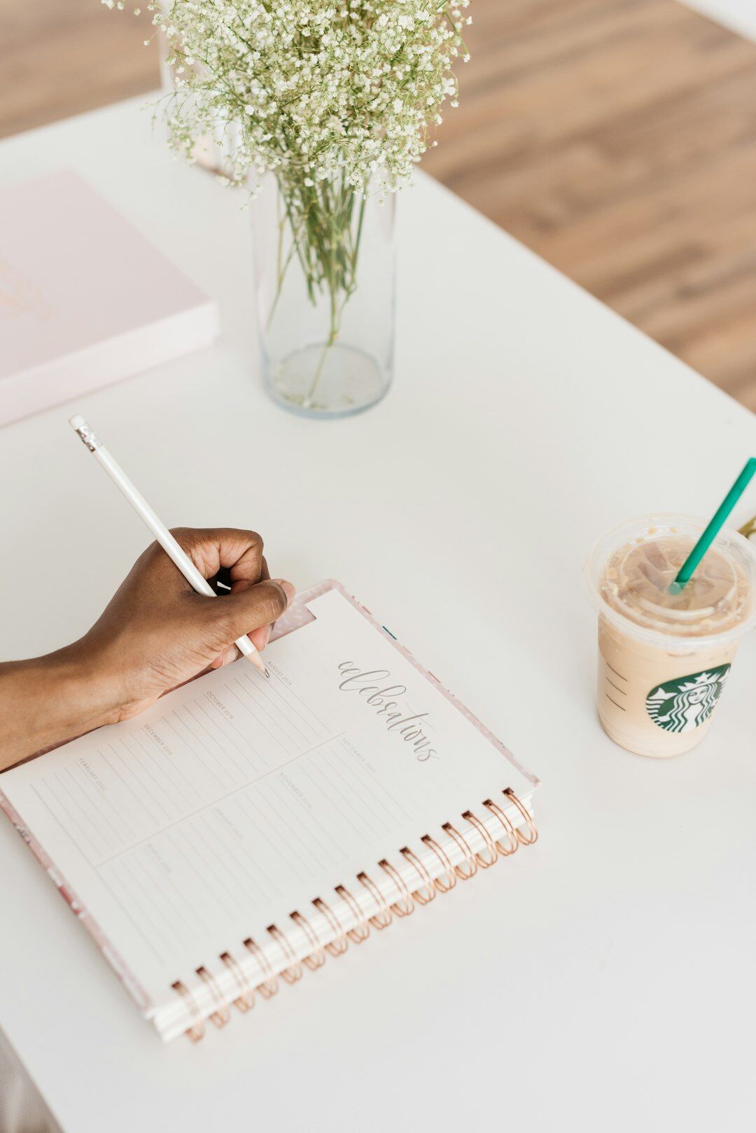 author at desk with coffee and notes