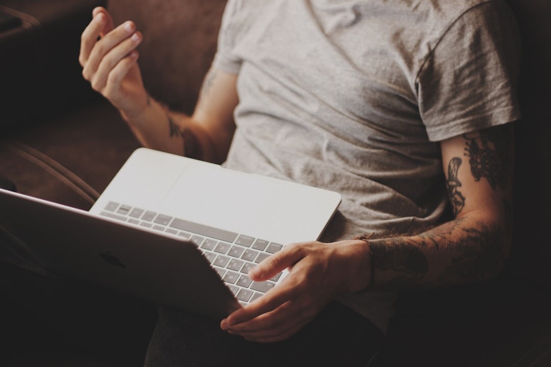 mystery writer typing dialogue on laptop