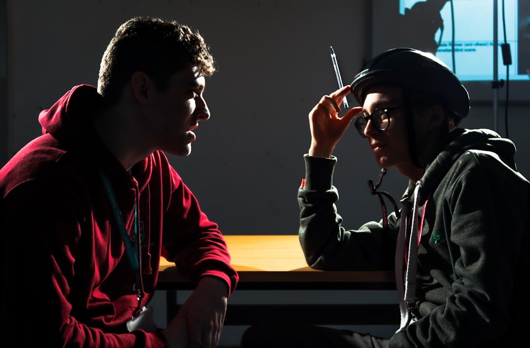 two characters in tense discussion