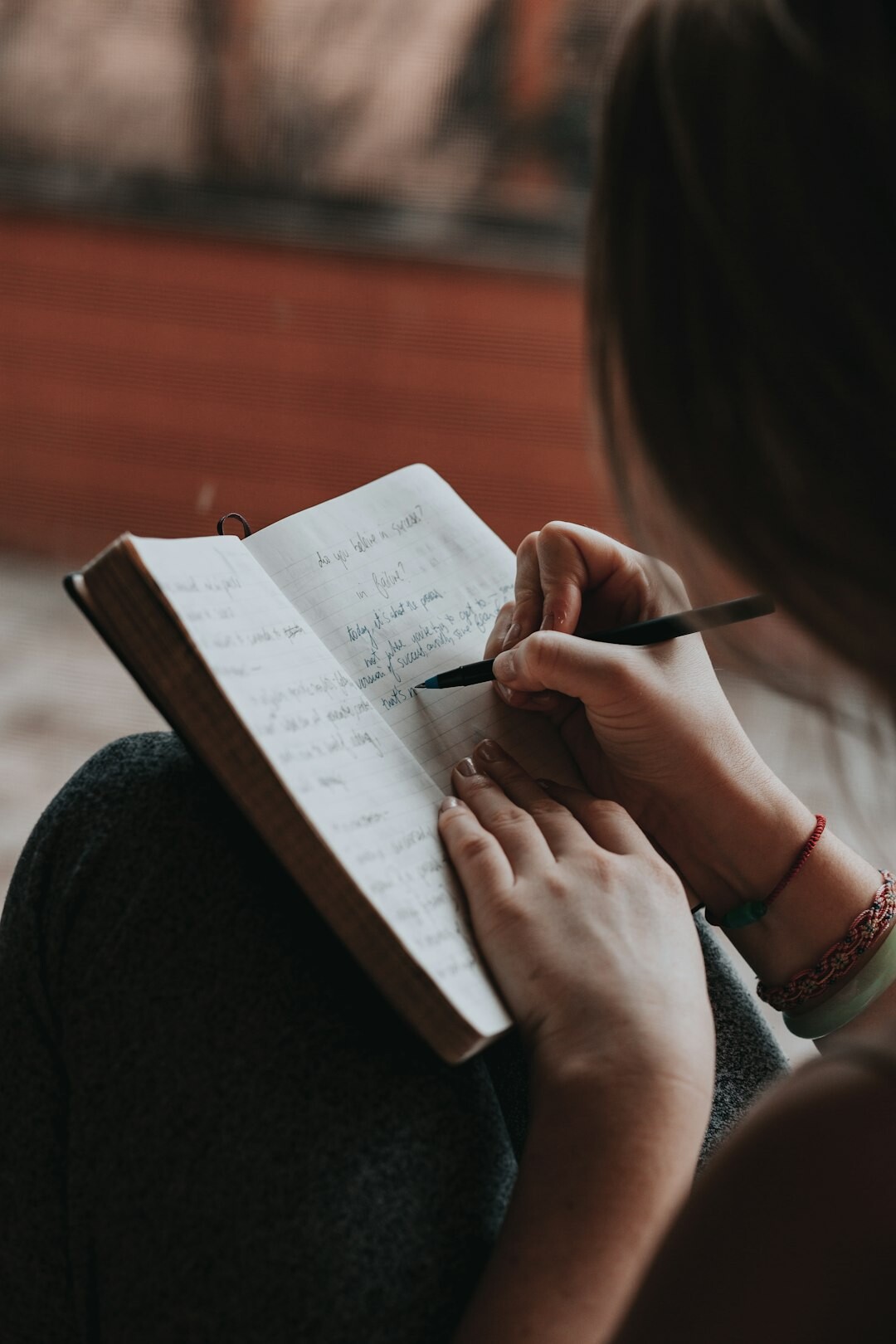 author writing notes