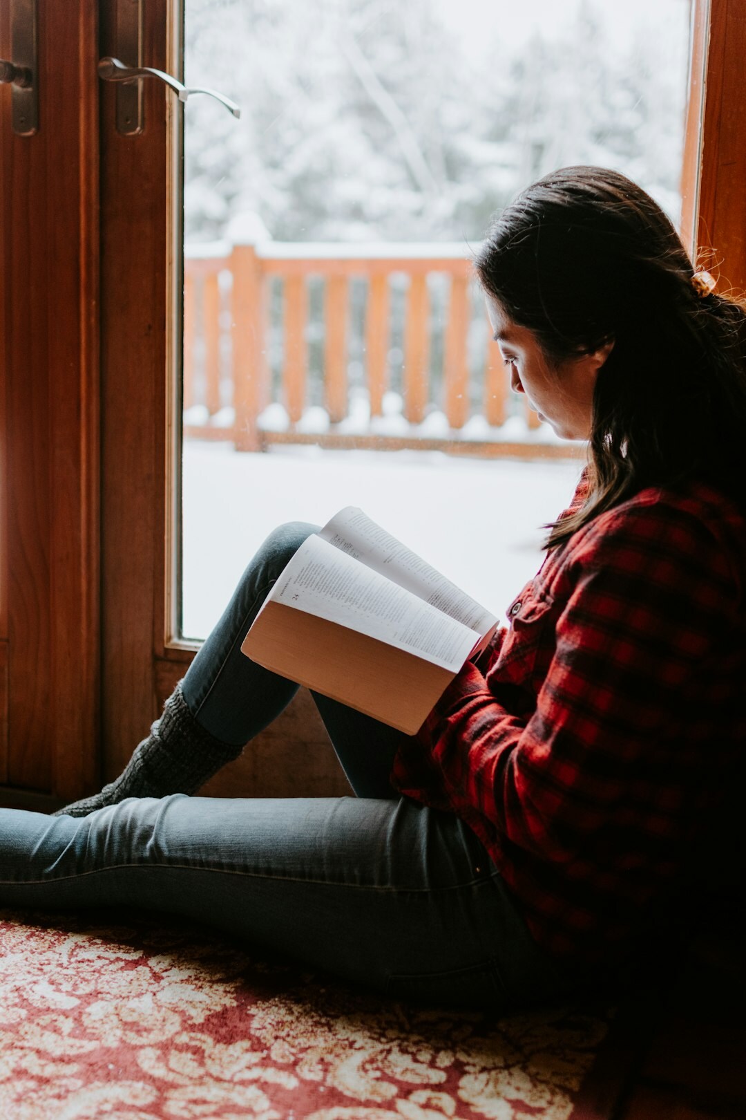 person reading mystery book